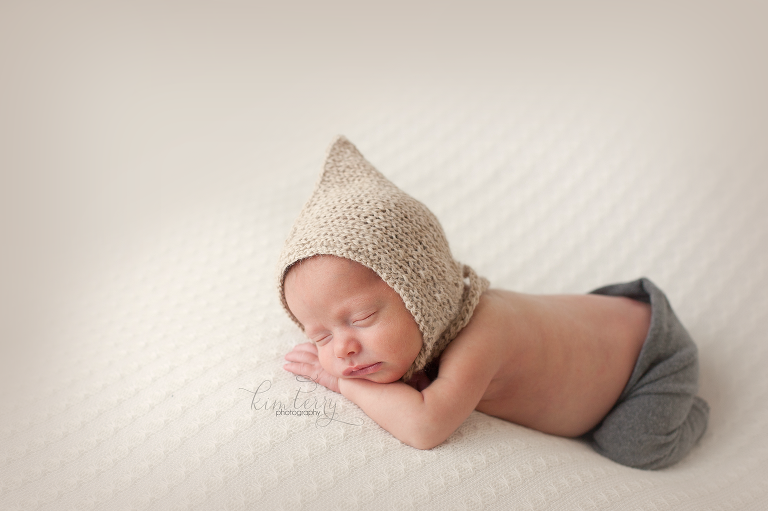 newborn baby with pixie hat
