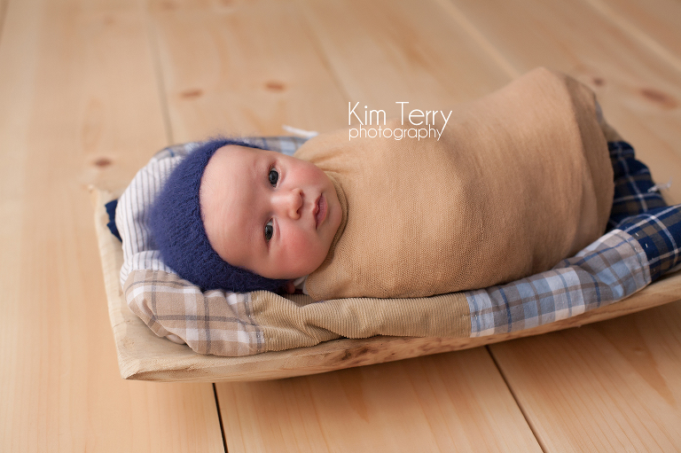 baby on prop wrapped